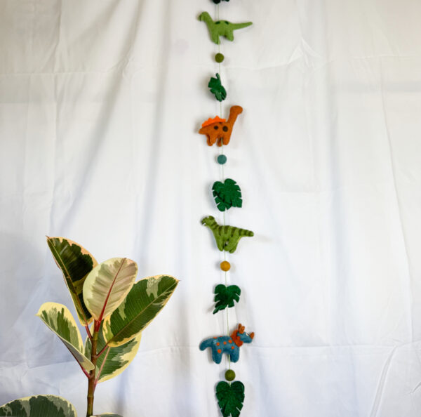 Fair-Trade Handmade Felt Dinosaur Hanger – Colorful Wool Dino Decor – Ethical Nursery or Playroom Wall Hanging